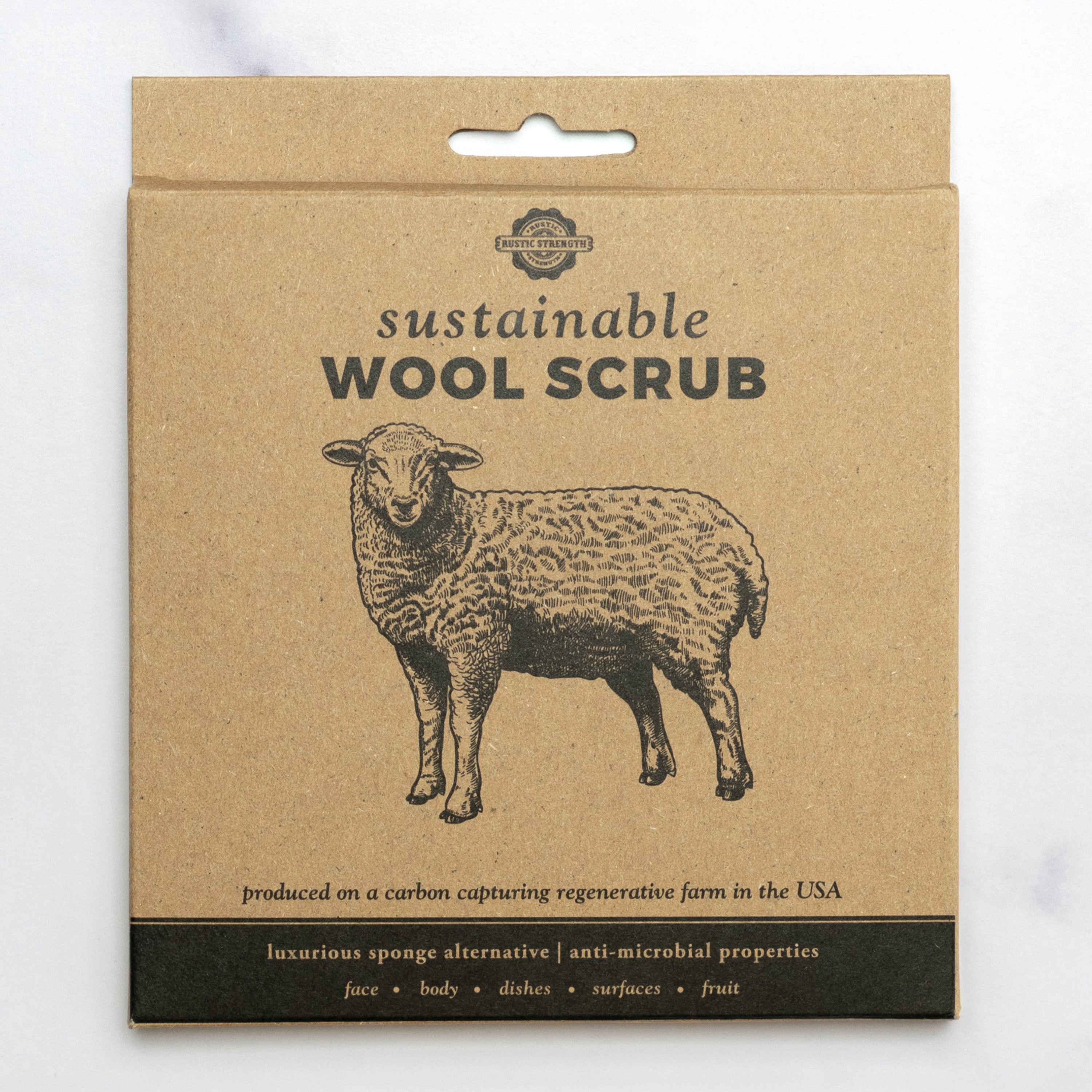 Package of sustainable wool scrub with a sheep illustration on a white background