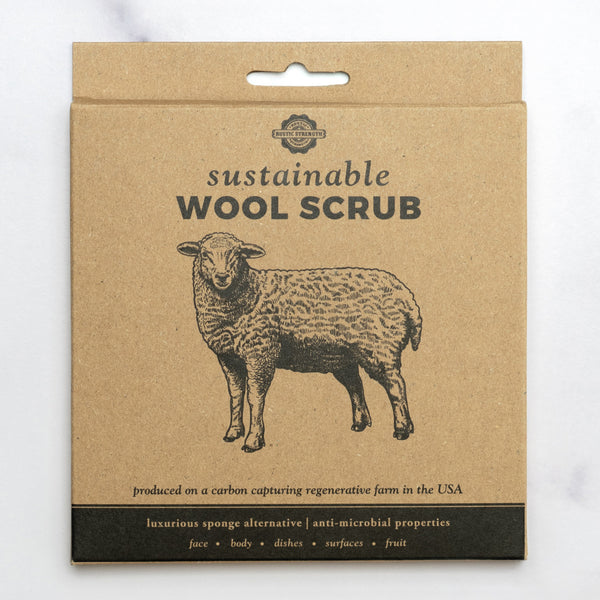 Package of sustainable wool scrub with a sheep illustration on a white background