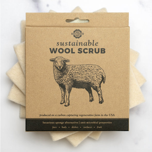 Sustainable wool scrub packaging with a sheep illustration on a white background