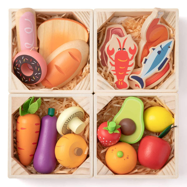 Close-up of wooden play food from the Tiny Land play kitchen set