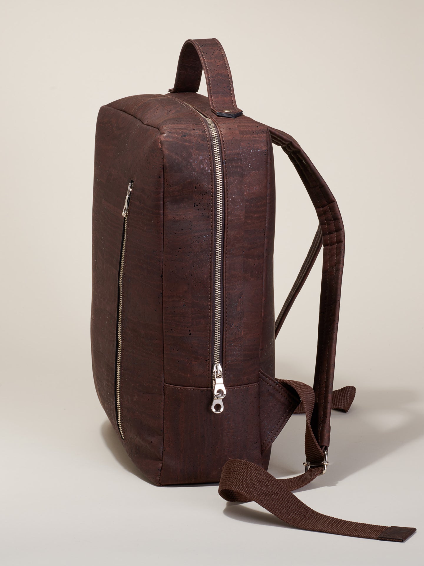 Sleek and sustainable cork backpack for modern commuters. Spacious, lightweight, and durable. Protects your laptop. Vegan, eco-friendly, and handmade. Elevate your style today.