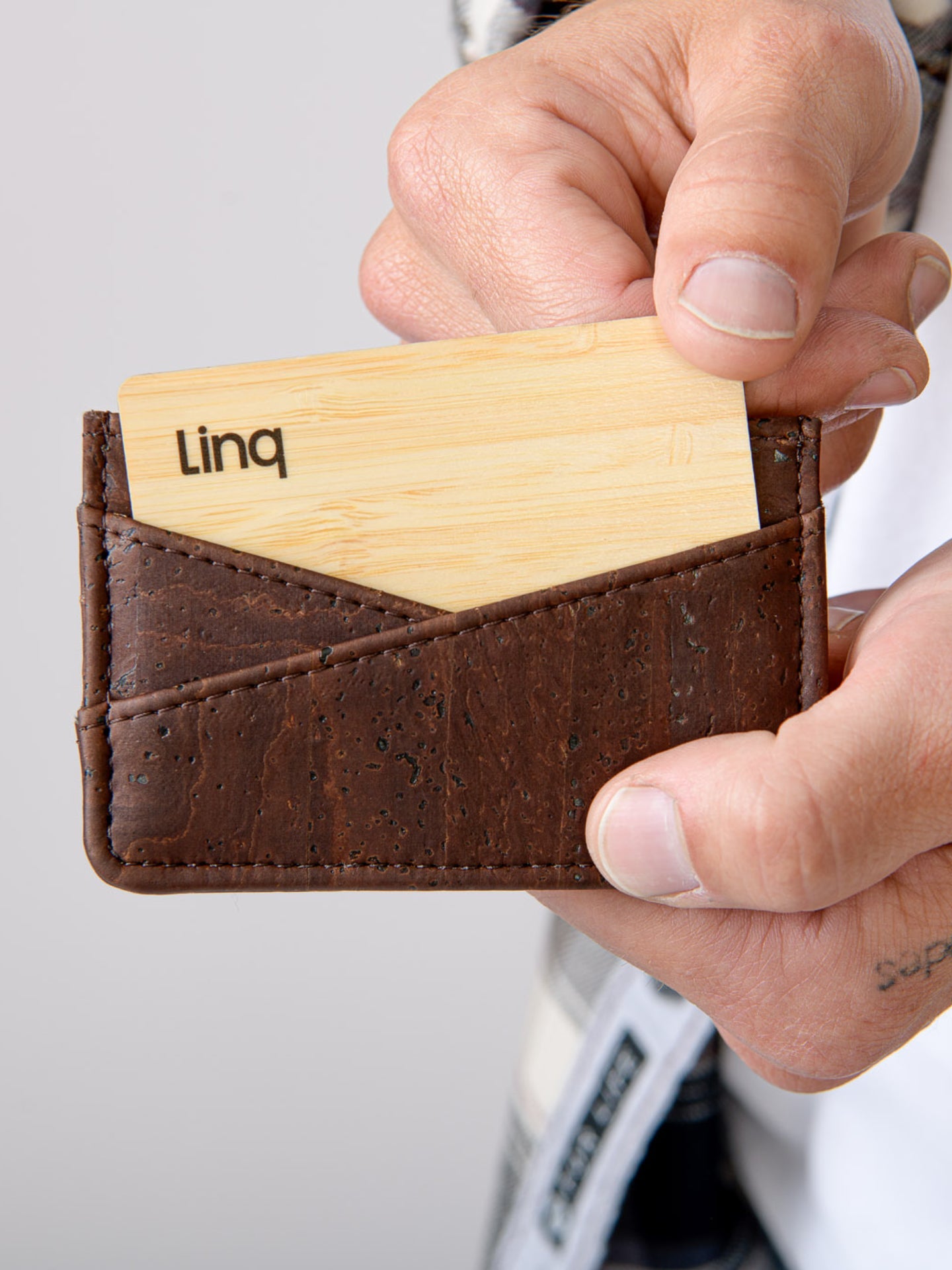 Sleek and minimalist cork cardholder wallet. Perfect for everyday carry. Eco-friendly, durable, and lightweight. Holds cards and cash. Stylish and functional. Order now!