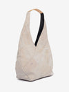 Beige tote bag with black strap on a white background