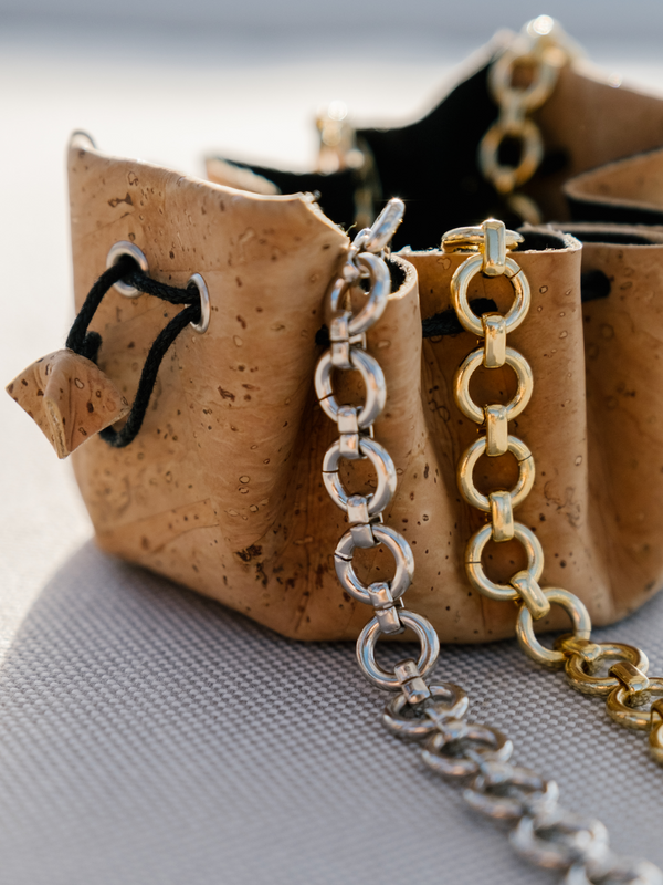 Porto cork jewelry travel pouch with cotton cording and cork flower detail, handmade in Portugal