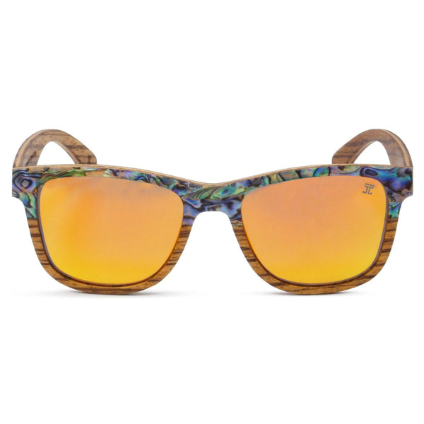 Joycoast Cirque Wayfinder wooden sunglasses flat lay showing abalone inlay and frame construction