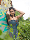 Full-length view of Fair Anita Wooden Warrior Tassel Necklace worn as a statement boho necklace