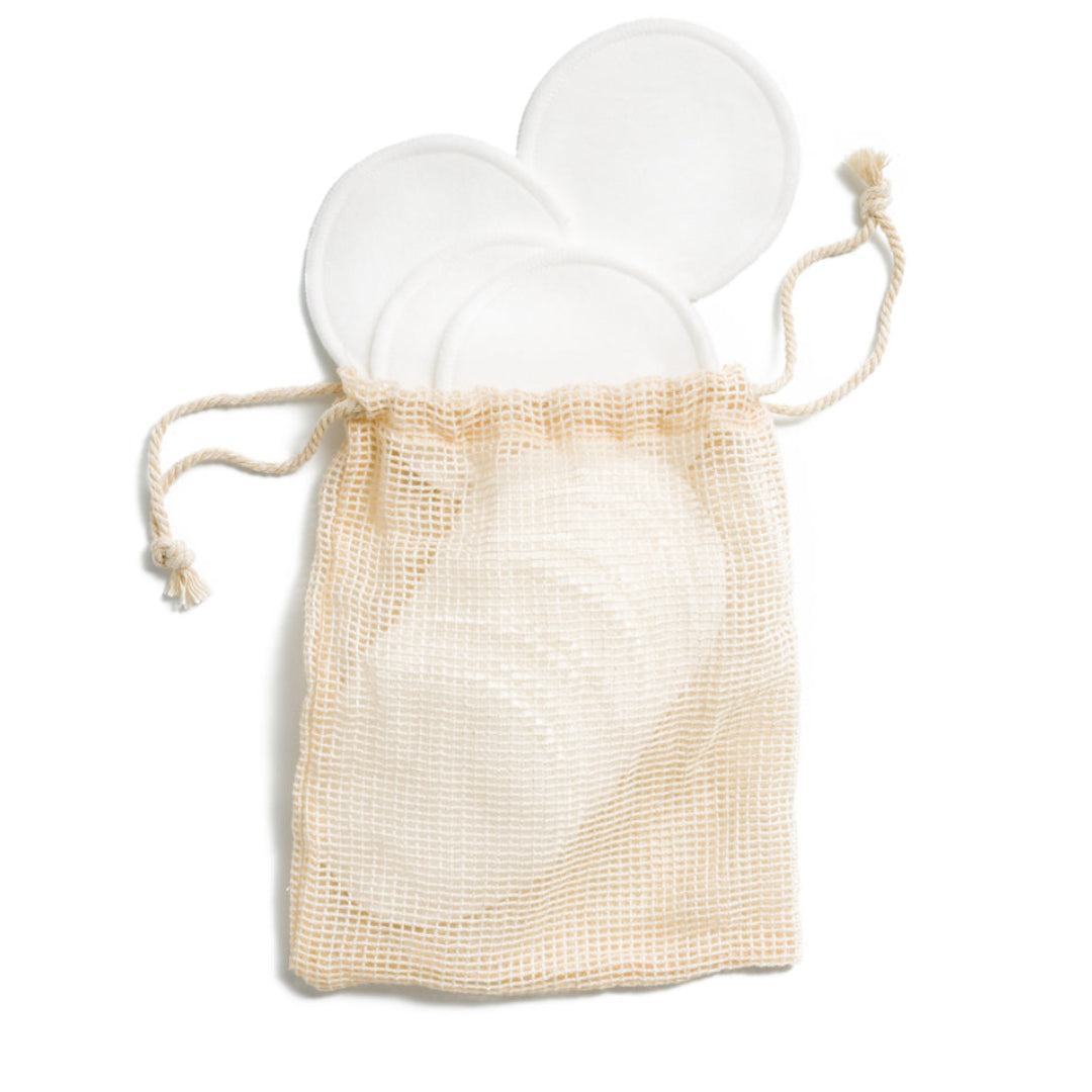 Desesh pack of 15 reusable natural cotton makeup remover pads with a machine-washable cotton mesh storage bag — zero waste and plastic-free