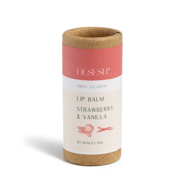 Desesh natural vegan lip balm in biodegradable cardboard tube scented with Strawberry and Vanilla essential oils – eco-friendly lip care