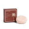 Desesh solid argan oil shampoo bar with lavender and lime essential oils and calamine in compostable cardboard packaging