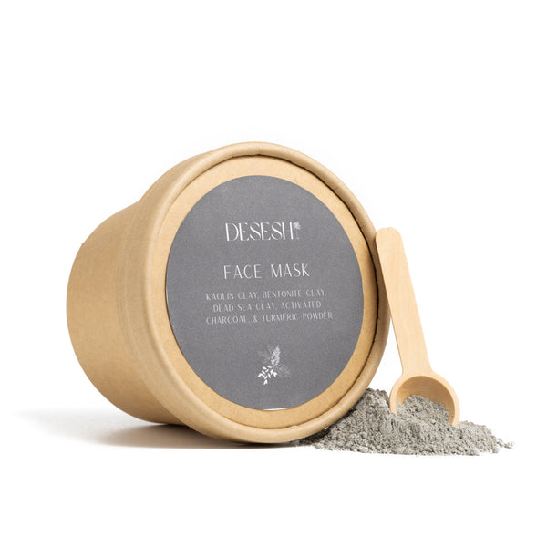 Desesh zero-waste activated charcoal and clay mineral face mask powder in eco-friendly packaging with powder shown