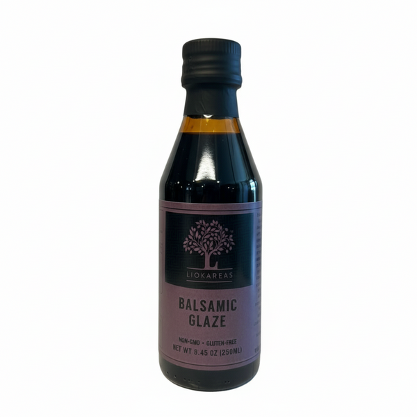 Bottle of balsamic glaze on a white background
