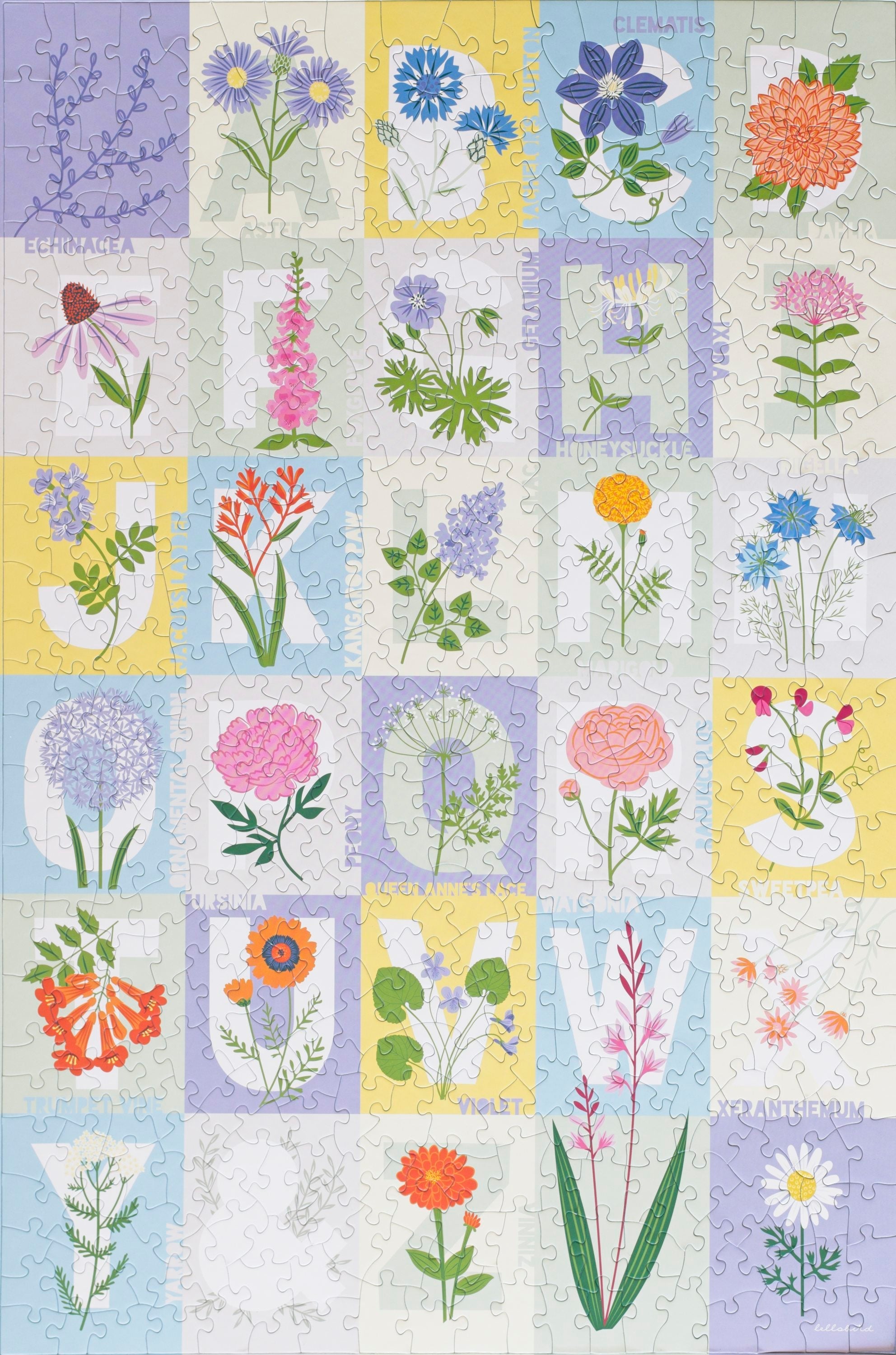 Completed ABC Flowers 500-piece jigsaw puzzle by Lellobird showing a botanical alphabet of flowers
