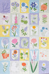 Completed ABC Flowers 500-piece jigsaw puzzle by Lellobird showing a botanical alphabet of flowers