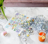 ABC Flowers 500-piece jigsaw puzzle by Lellobird shown in a lifestyle setting