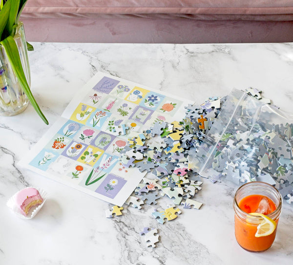 ABC Flowers 500-piece jigsaw puzzle by Lellobird shown in a lifestyle setting