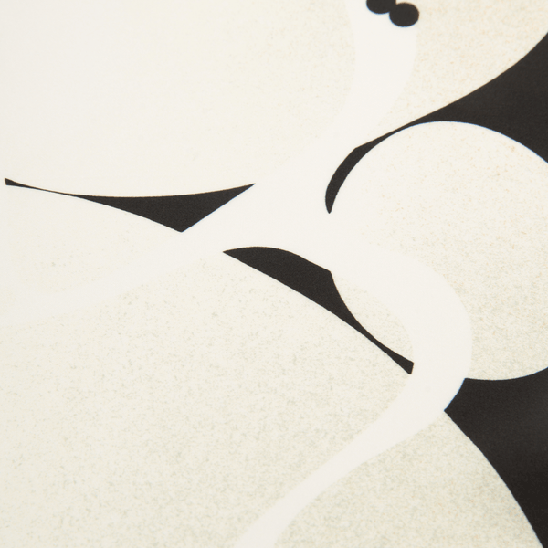 Abstract design with black and white shapes on a beige background