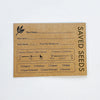 Set of 6 kraft paper seed saving envelopes by Seattle Seed Company with printed fields for plant information