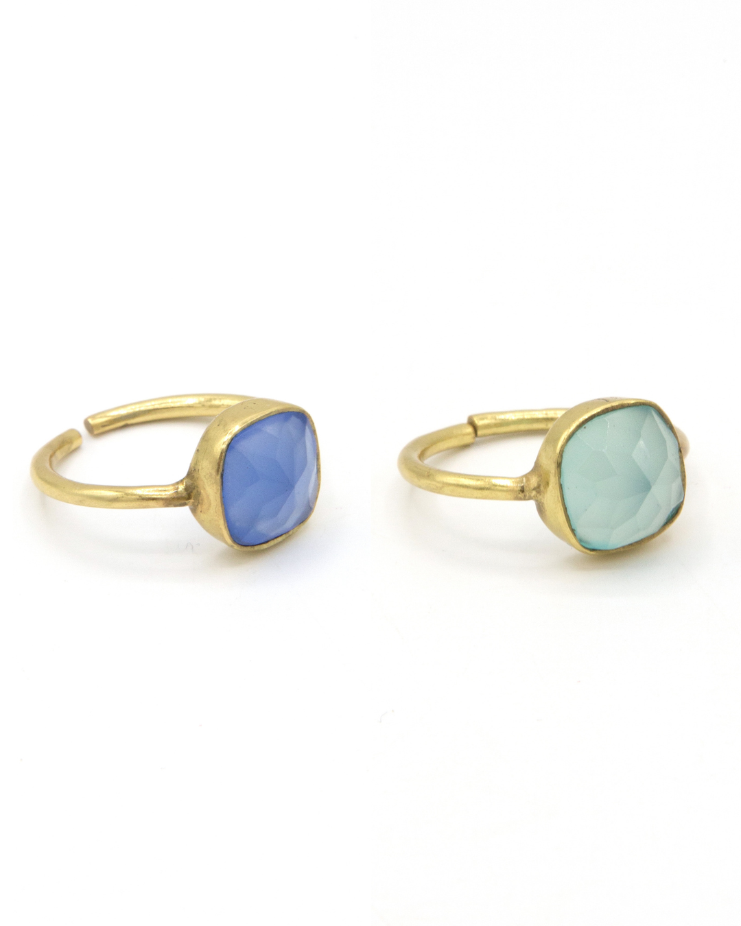 Adjustable semi-precious stone ring in gold-plated recycled brass on a flat surface