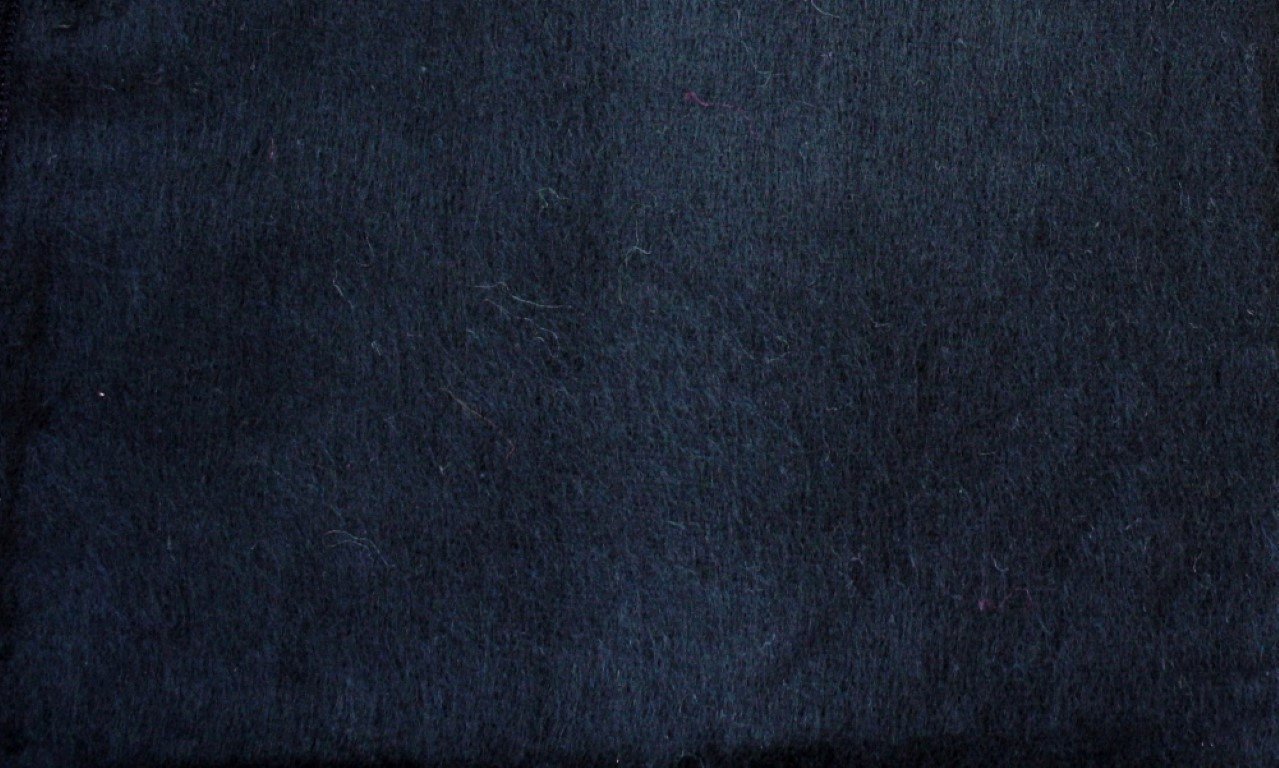 Close-up of dark blue fabric texture