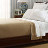 Purely Alpaca soft alpaca bed blanket in multiple colours folded and stacked