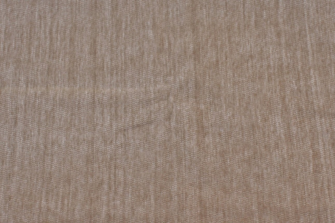 Close-up of a beige fabric texture