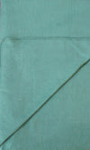 Teal fabric with a visible seam