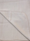 Close-up of beige fabric with a subtle pattern
