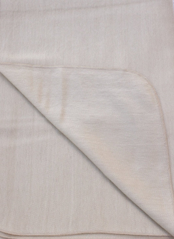 Close-up of beige fabric with a subtle pattern