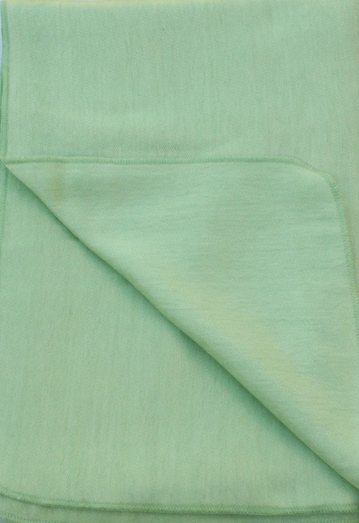 Folded light green fabric with a subtle pattern
