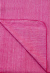 Close-up of pink fabric with a diagonal fold