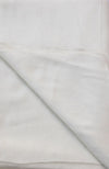 Close-up of light gray fabric with a subtle pattern