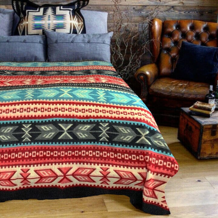 Purely Alpaca Southwest Aztec patterned bed blanket in turquoise, full product view