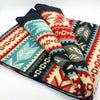 Purely Alpaca Southwest patterned alpaca blanket draped showing reversible weave detail