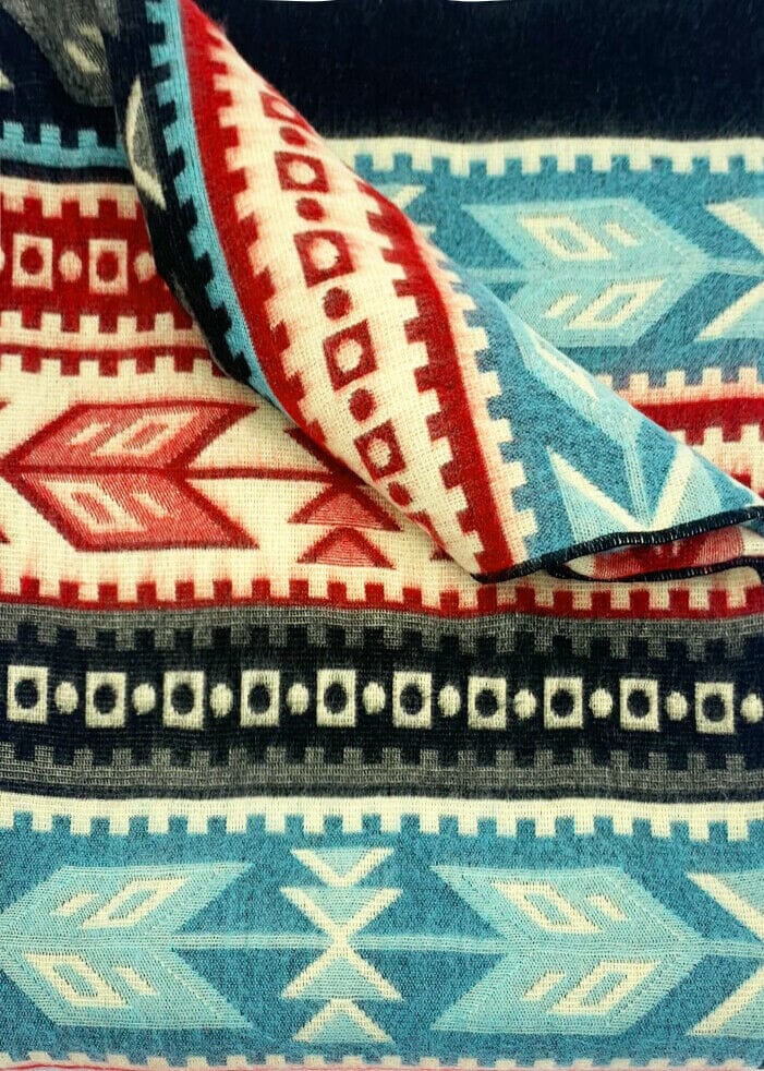 Purely Alpaca Southwest patterned blanket laid flat showing full 79 by 92 inch size