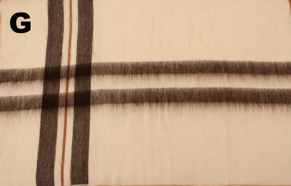 Close-up of a fabric with plaid pattern on a beige background