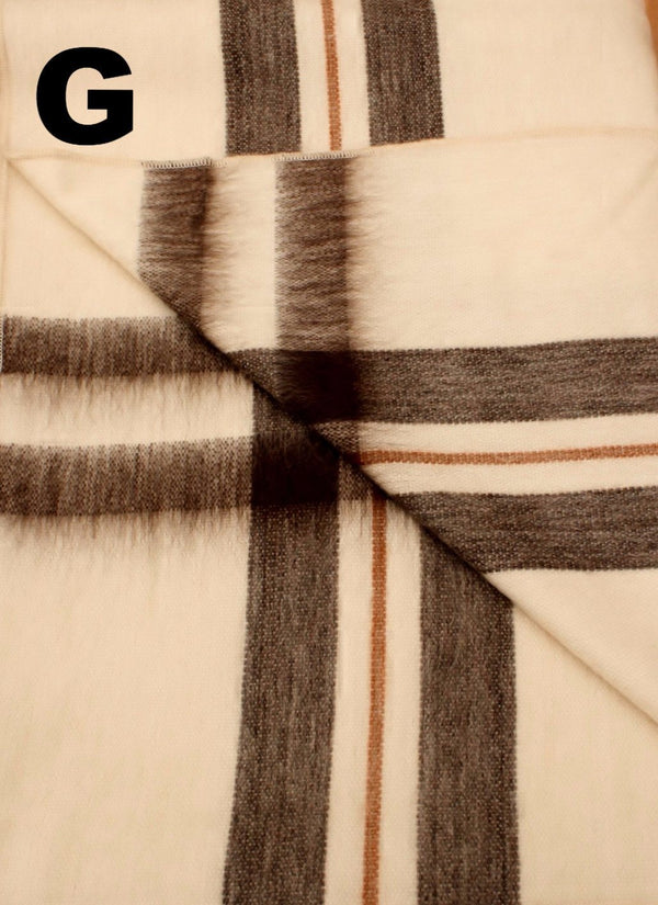 Close-up of plaid fabric with brown and beige colors