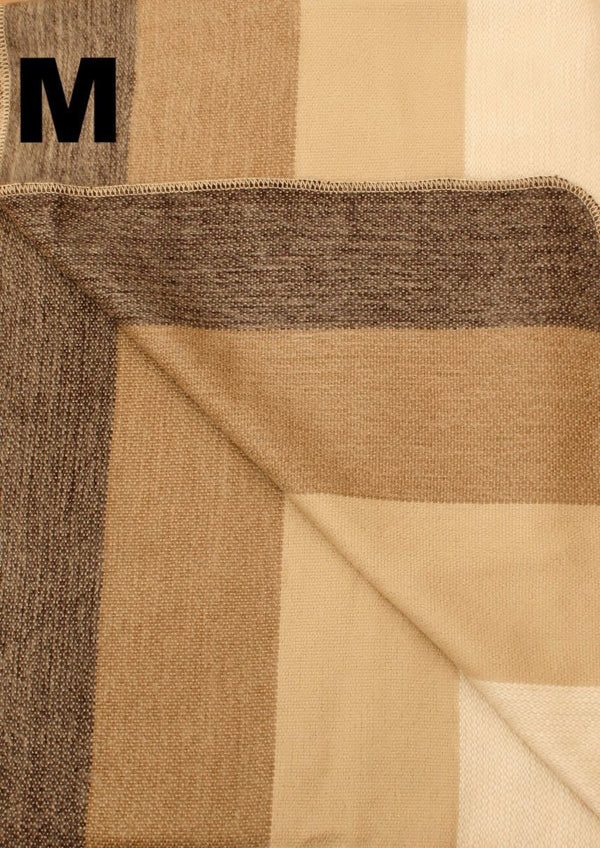 Close-up of a folded fabric with brown and beige pattern, labeled 'M'.