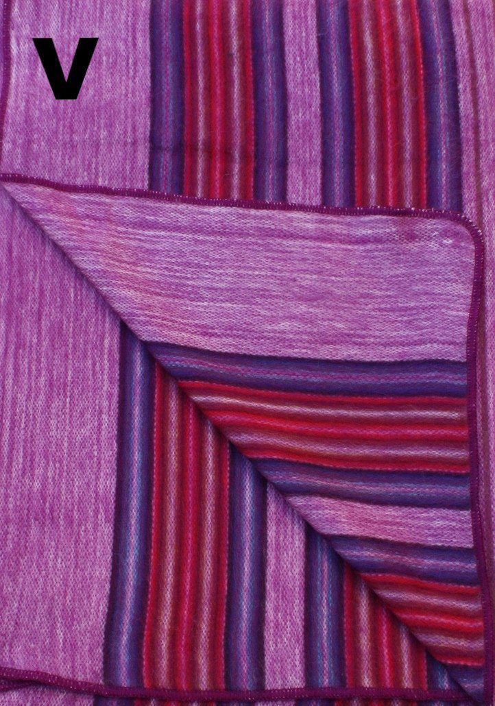 Close-up of a textured fabric with purple and red stripes