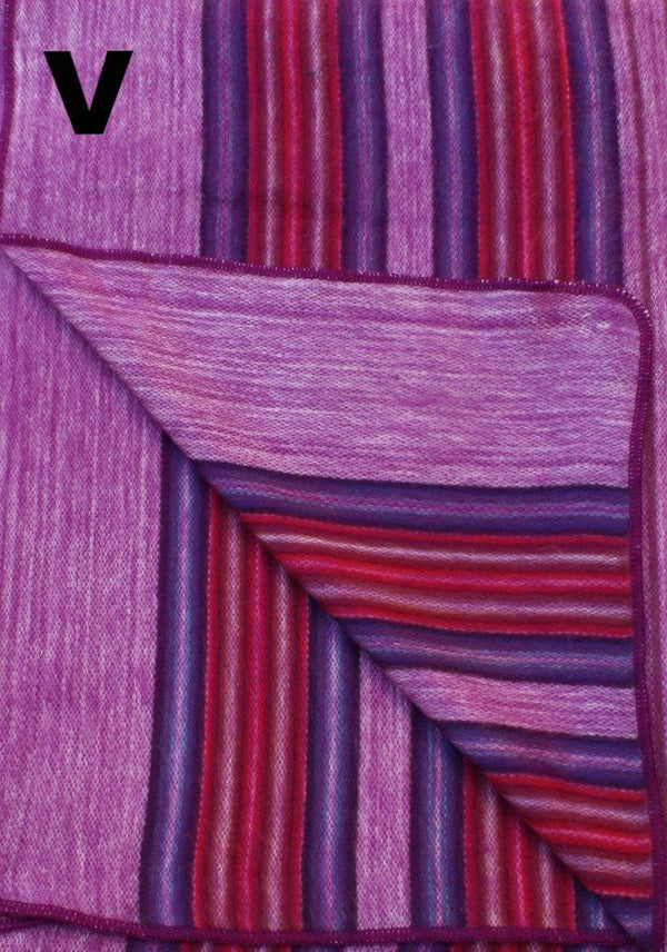 Close-up of a textured fabric with purple and red stripes