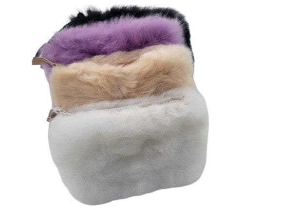 Fur-trimmed pouch with white base, beige middle section, and purple top on a white background