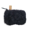Black fur pouch with a tag on a white background