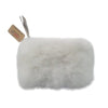 Gray fluffy pillow with a tag on a white background
