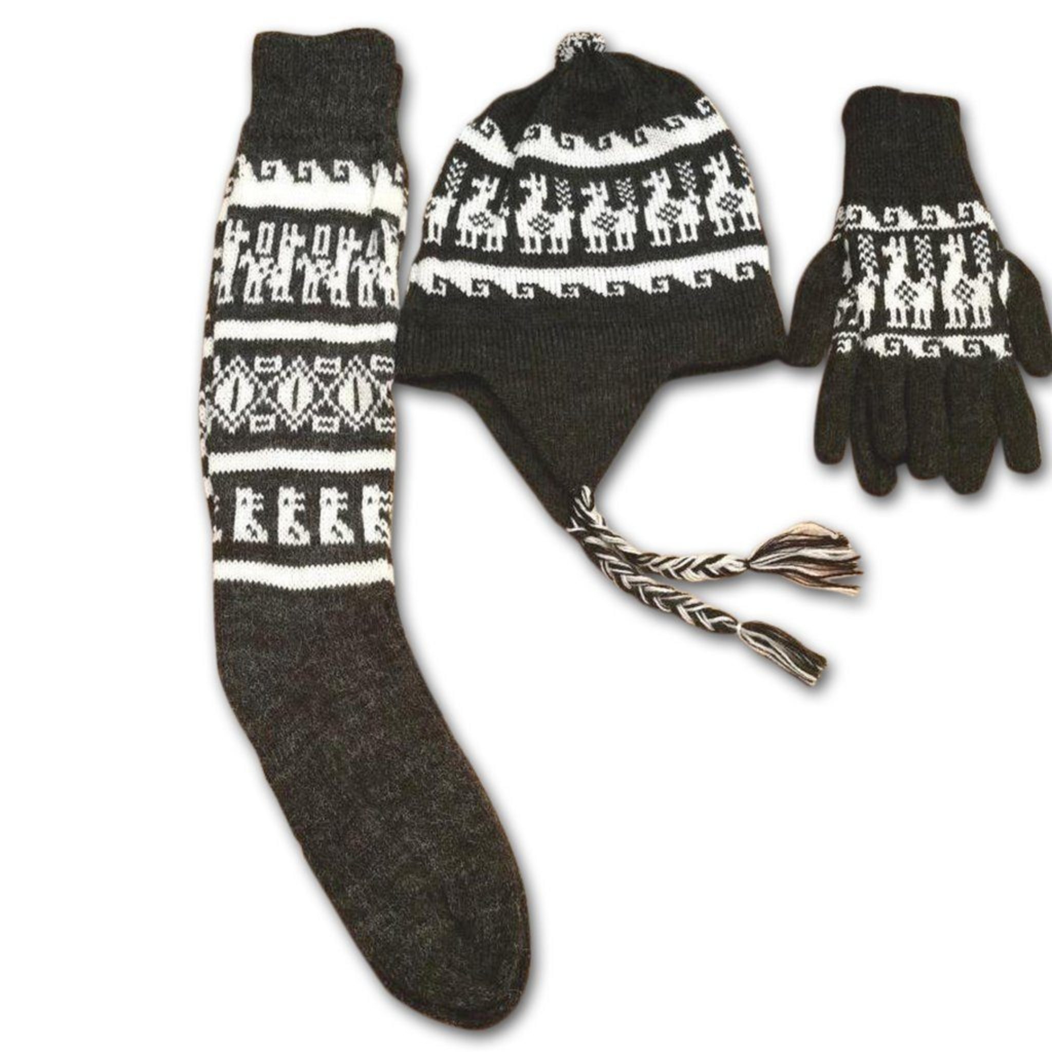 Set of black and white patterned hat, gloves, and sock on a white background