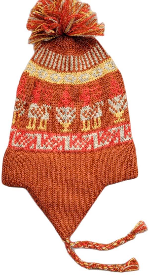 Knitted hat with animal patterns and a pom-pom on a white background