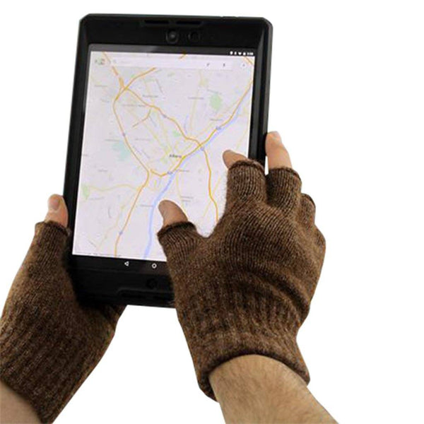 Person using a tablet with fingerless gloves on a white background