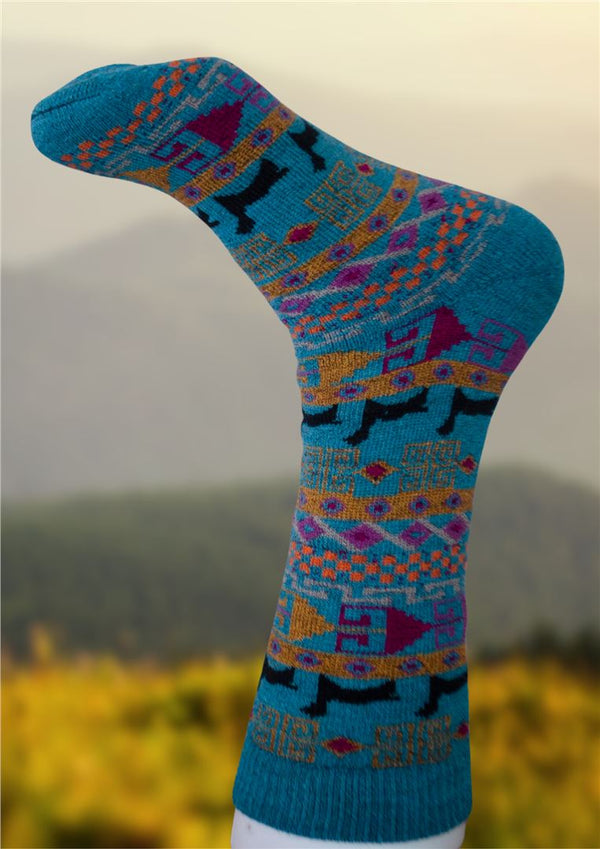 Colorful sock with pattern against a blurred natural background