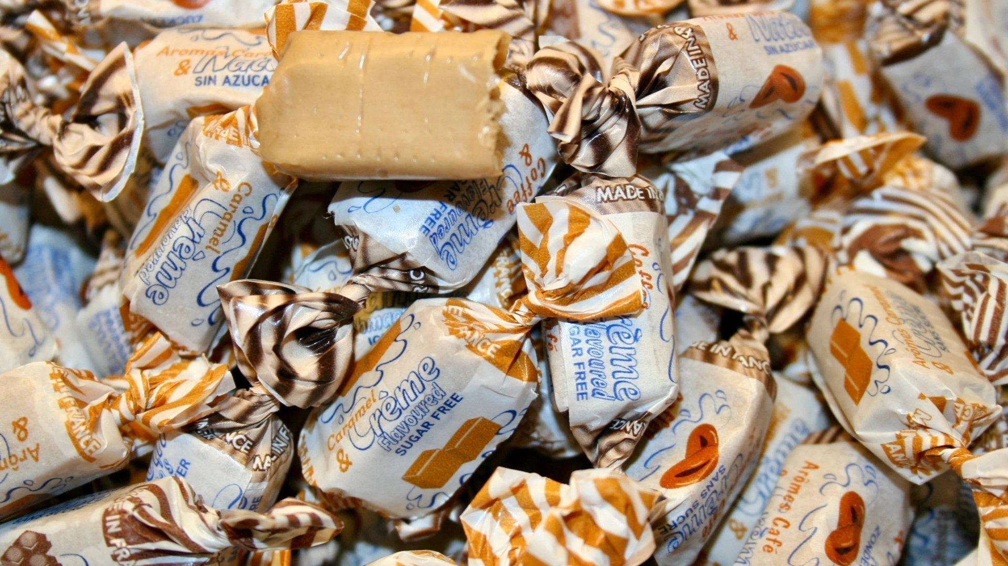 Close-up of Andy Anand sugar-free cream taffy toffees showing chewy creamy texture — keto and diabetic-friendly candy