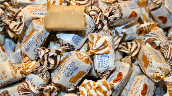 Close-up of Andy Anand sugar-free cream taffy toffees showing chewy creamy texture — keto and diabetic-friendly candy