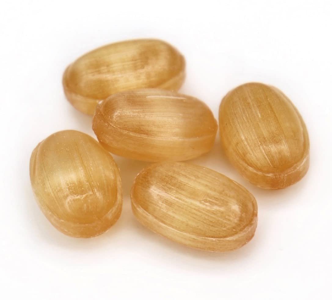 Five light brown wooden beads on a white background