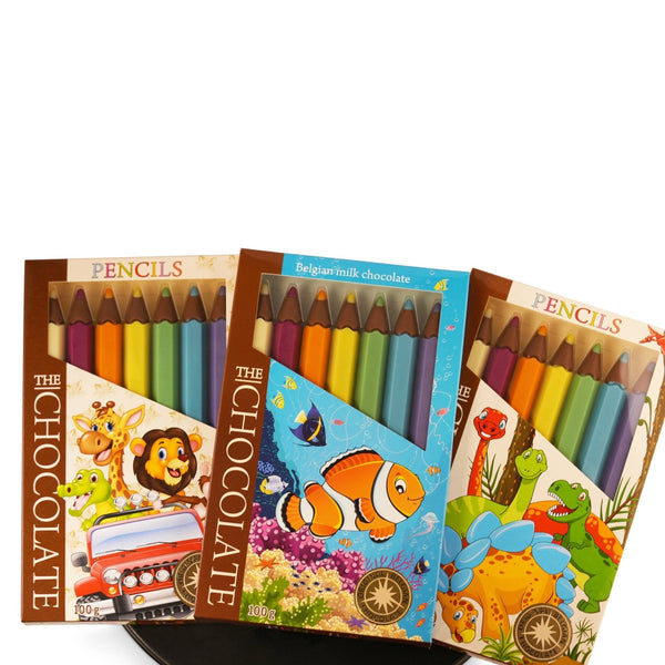 Three packages of chocolate pencils with colorful designs on a white background